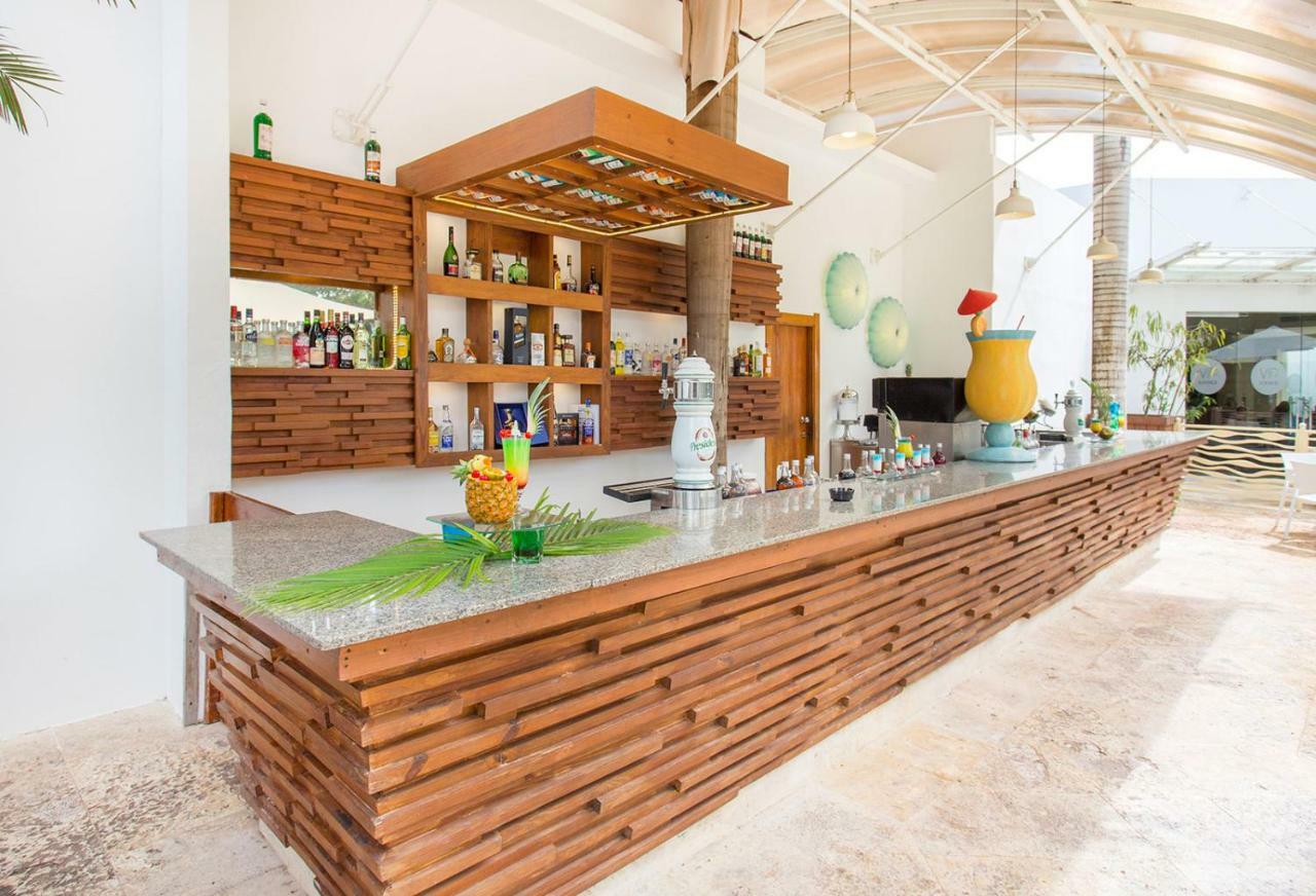 Be Live Collection Canoa Bayahibe Exterior photo The bar at the Beach Club